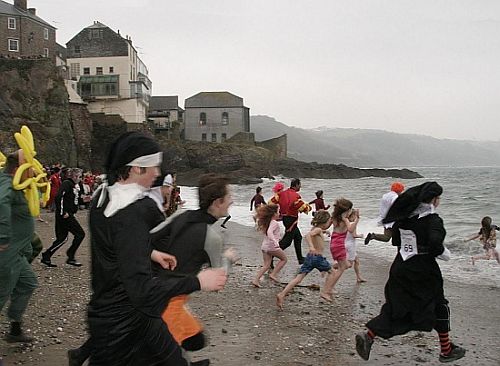 When the horn sounds everyone rushes to the sea for the swim When the horn sounds everyone rushes to the sea for the swim