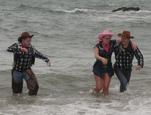 Even cowgirls go for the charity swim Even cowgirls go for the charity swim